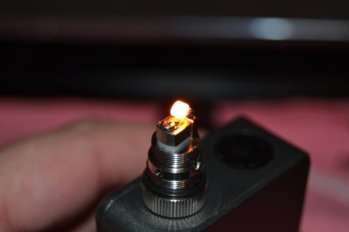 02_BurningA1.2OhmCoilOnAKayFunMini-WifesTank.jpg