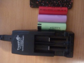 Charger and Batteries.jpg Charger and Batteries.jpg