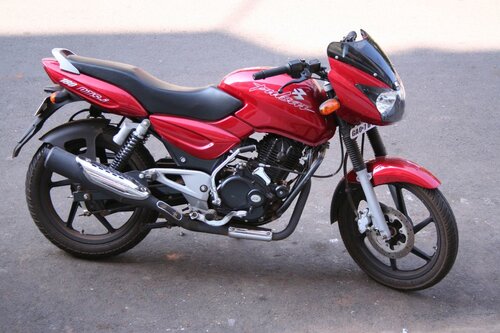 1200px-Red_Bajaj_Pulsar.jpg