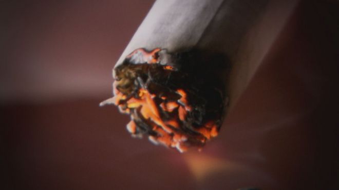 _86954293_ciggyburning.jpg