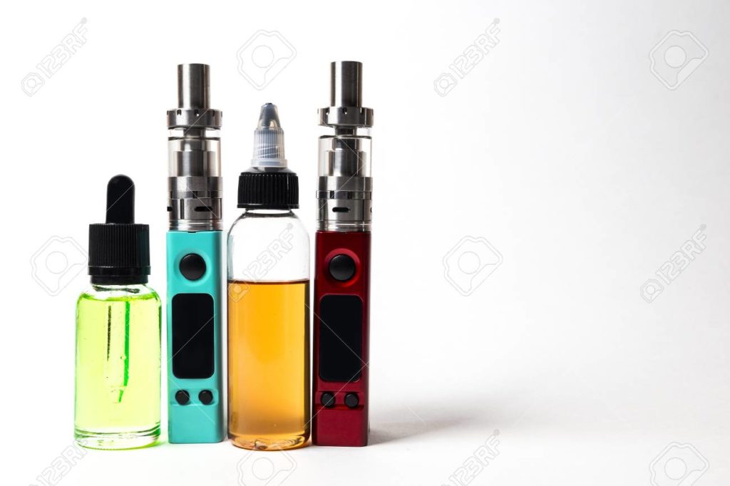 98113708-e-liquid-e-juice-in-the-bottles-and-e-cigarette-vape-isolated-on-the-white-background-with-copyspace-1024x682.jpg