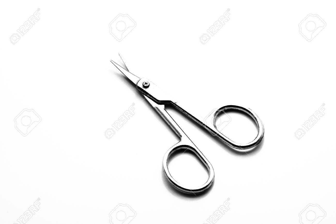 71956546-nose-hair-scissors-with-copy-space-high-key-.jpg